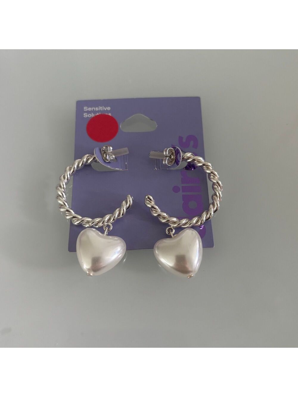 Claire’s Twisted Hoops with Hearts Earrings